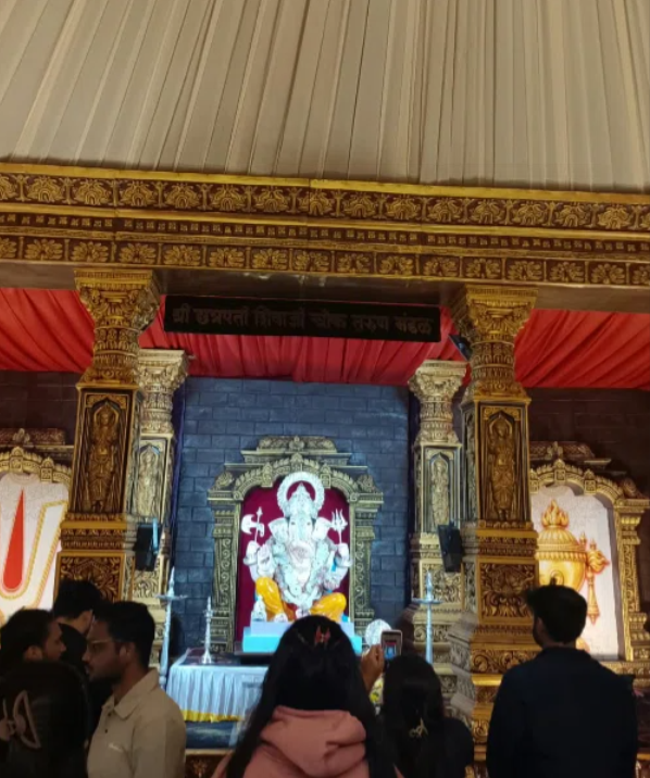 Traditional mandal decoration with gold pillars at Shivaji Chowk Hinjewadi