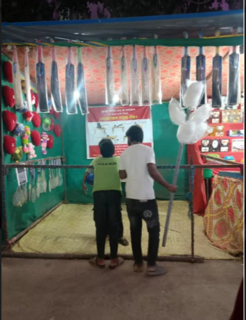 Traditional coin toss game stall at Hinjewadi Ganeshotsav