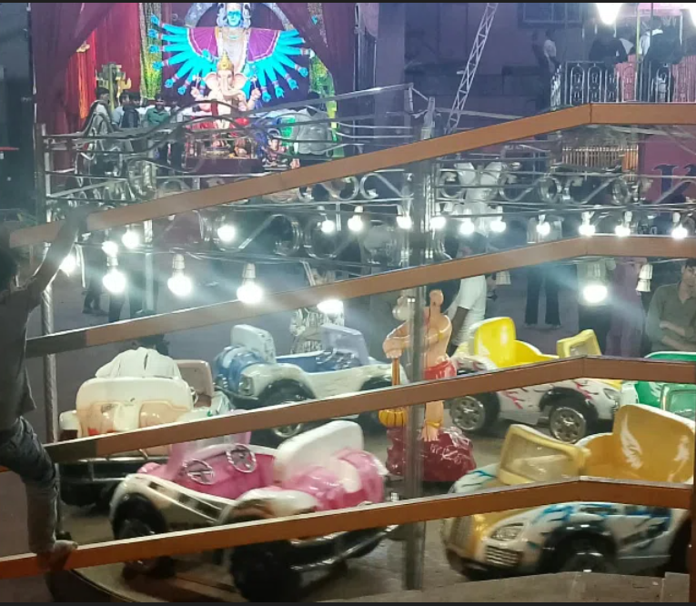Toy car rides for children at Pune Ganeshotsav